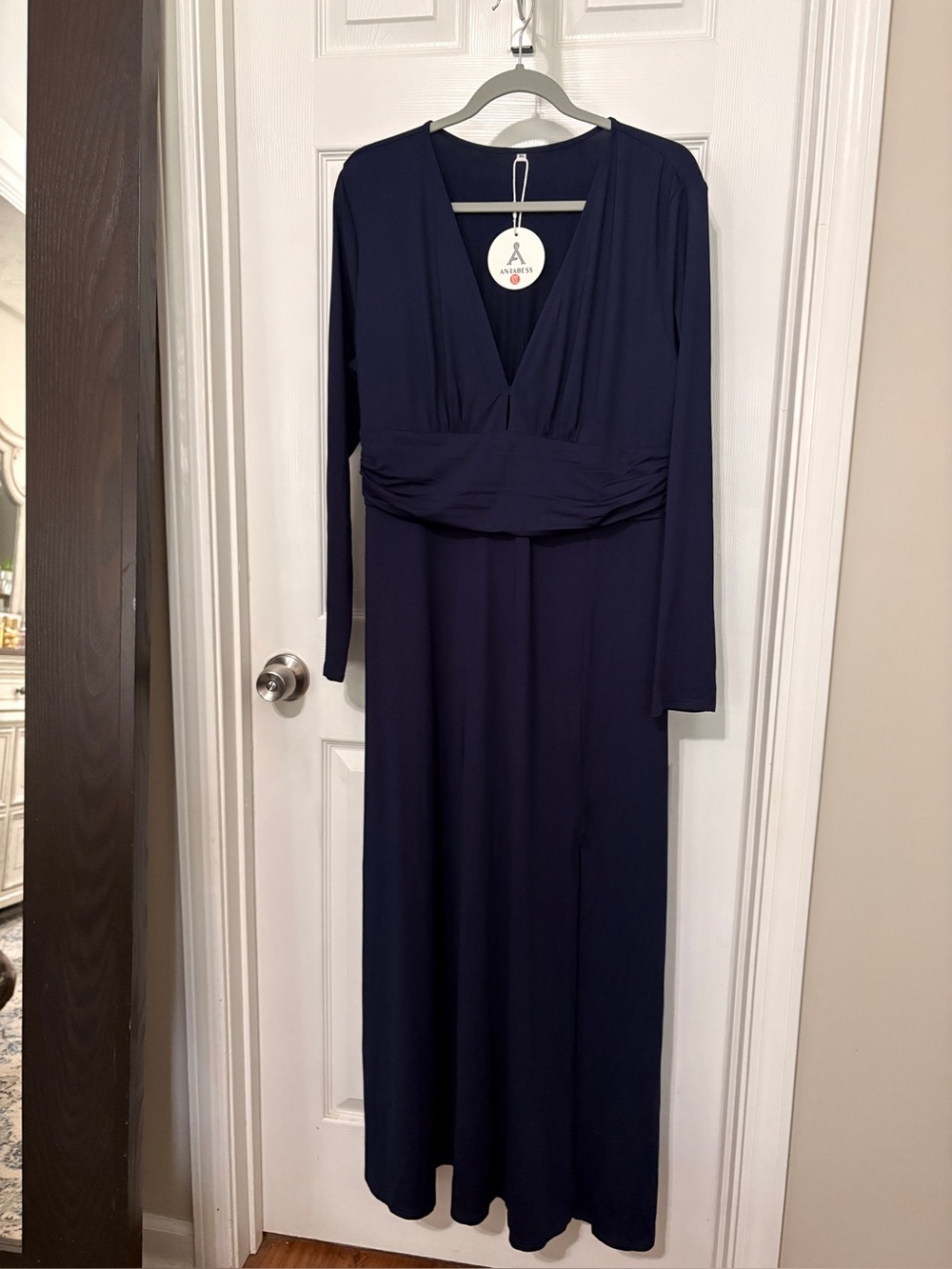 Deep Navy Long Sleeve V-Neck Maxi Dress. Keyhole between breast